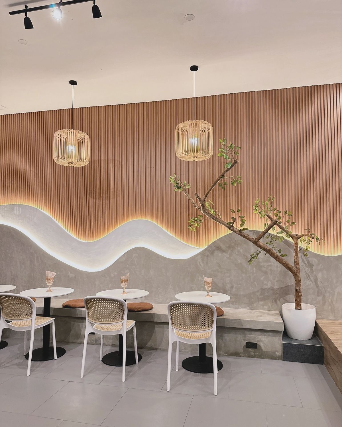Theme Cafe Dining Space featuring Acoustic Brick Finish & Greenery Accents #2